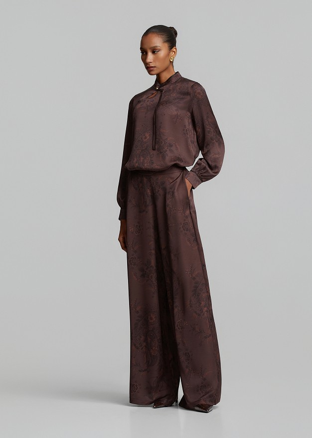 Printed trousers in satin-look finish