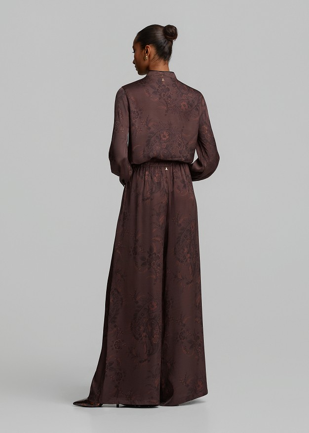 Printed trousers in satin-look finish