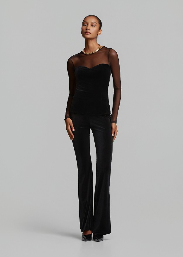 Velvet-look flared trousers
