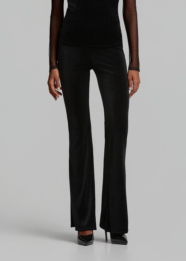 Velvet-look flared trousers