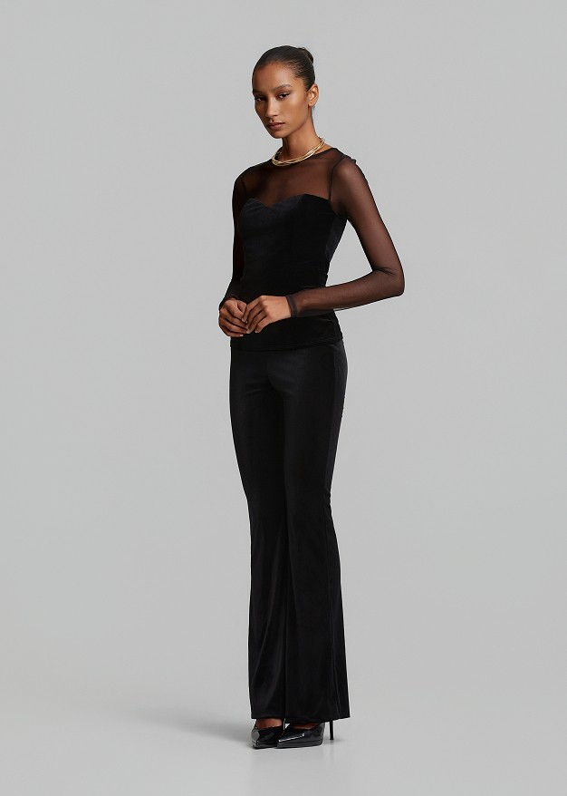 Velvet-look flared trousers