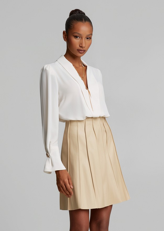 Mini skirt with textured pleats