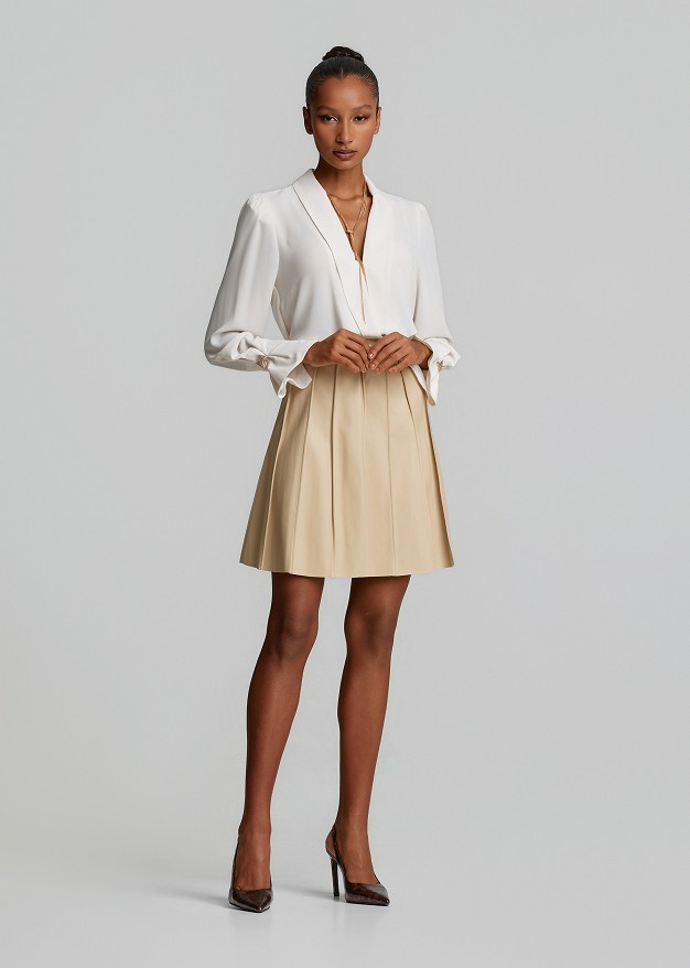 Mini skirt with textured pleats