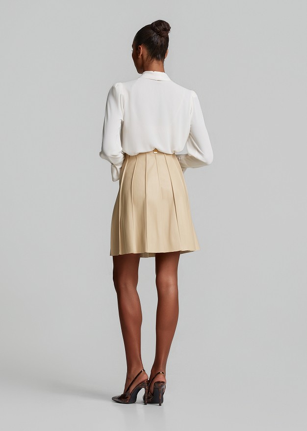 Mini skirt with textured pleats