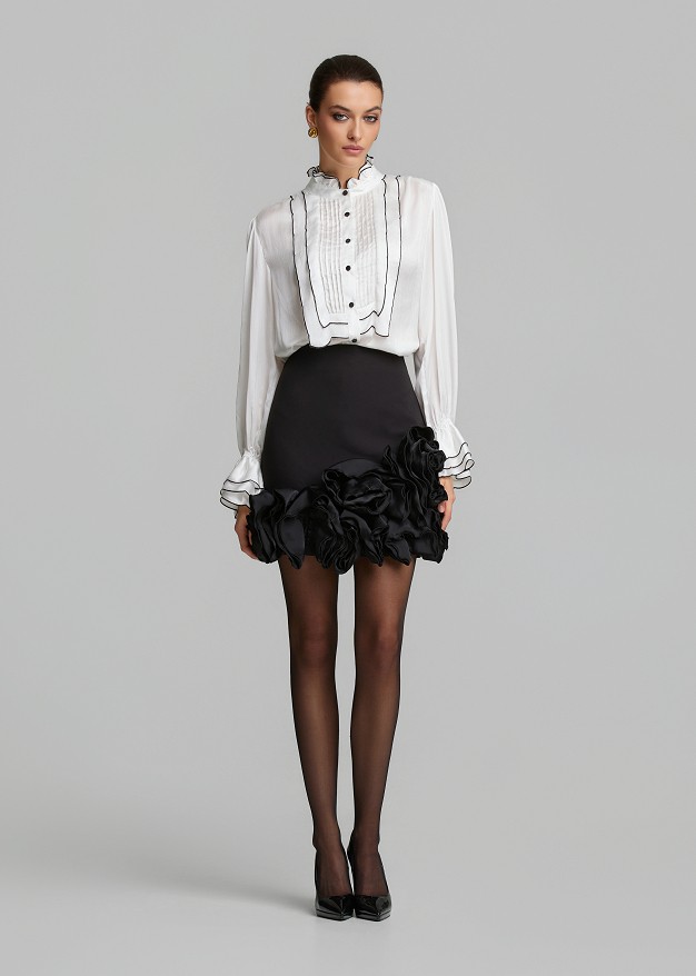 Mini skirt with satin-effect floral appliqué