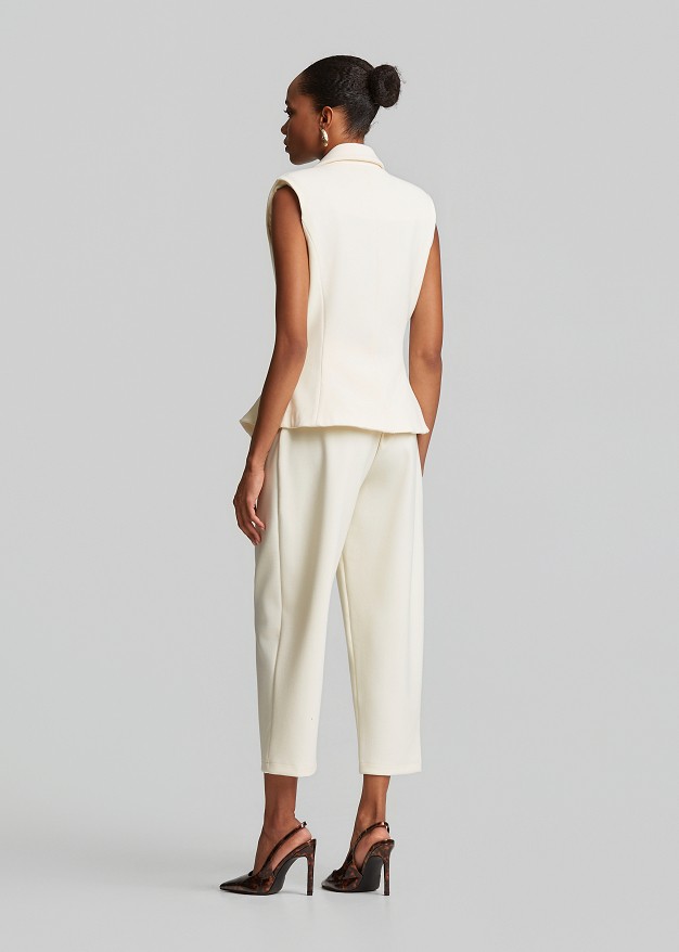 Σταυρωτό γιλέκο με peplum