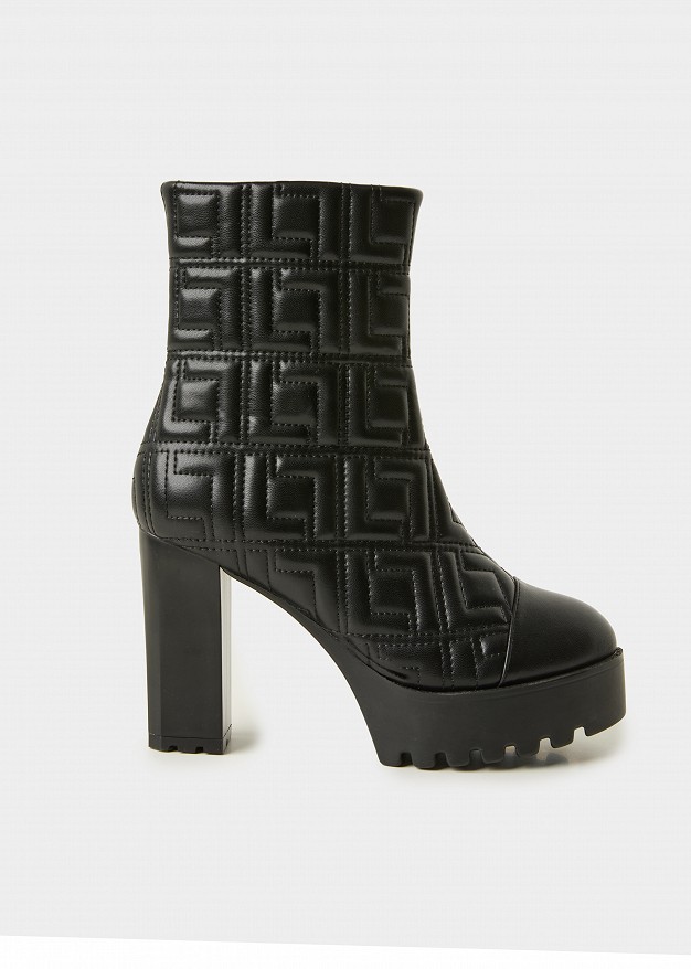 High-heeled quilted boots