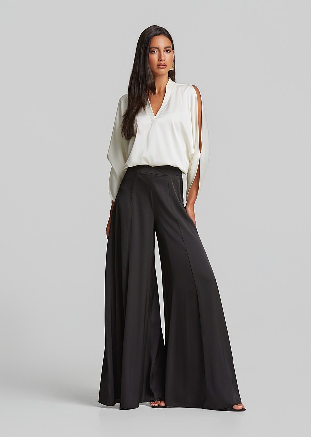Top with cut-out details and a satin finish