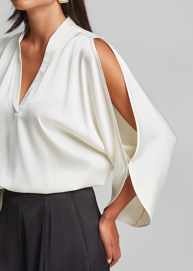 Top with cut-out details and a satin finish