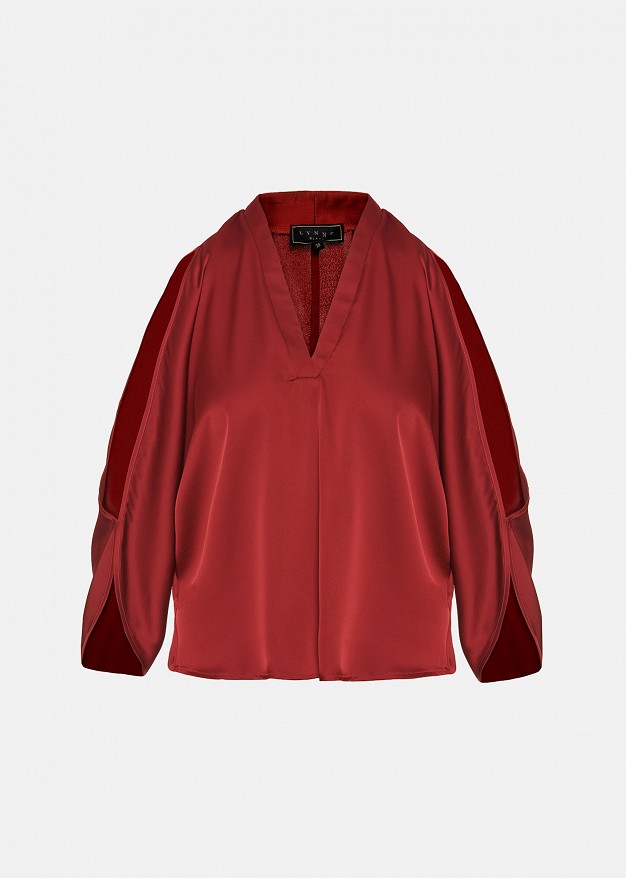 Top with cut-out details and a satin finish