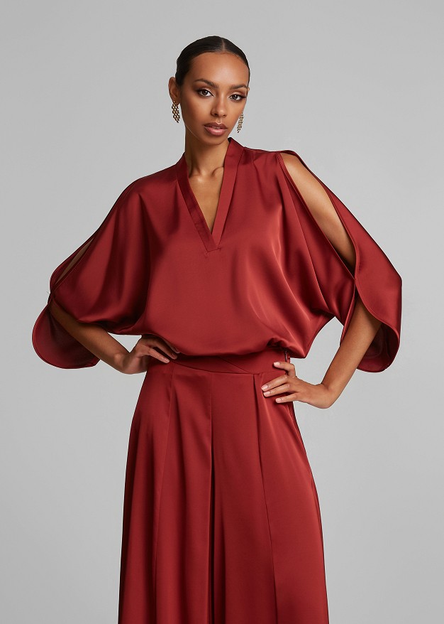 Top with cut-out details and a satin finish