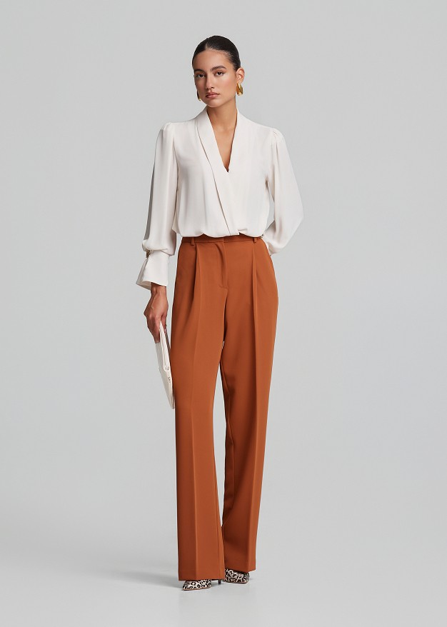 Wrap blouse with lapels in semi-sheer fabric