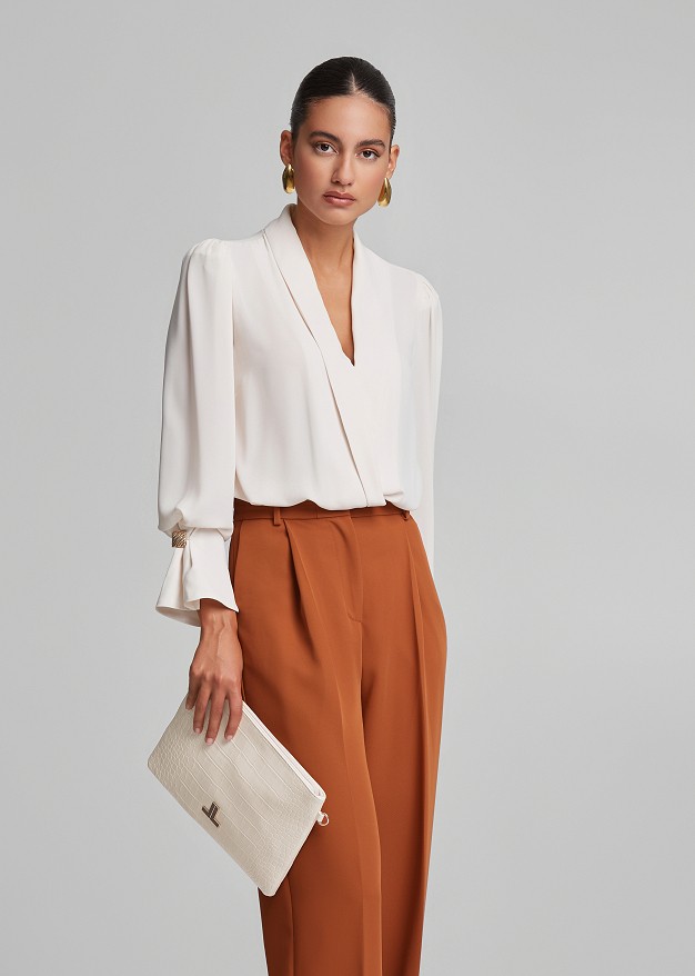 Wrap blouse with lapels in semi-sheer fabric