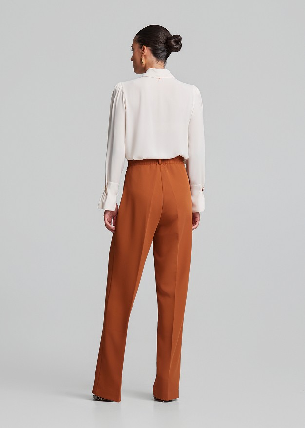 Wrap blouse with lapels in semi-sheer fabric
