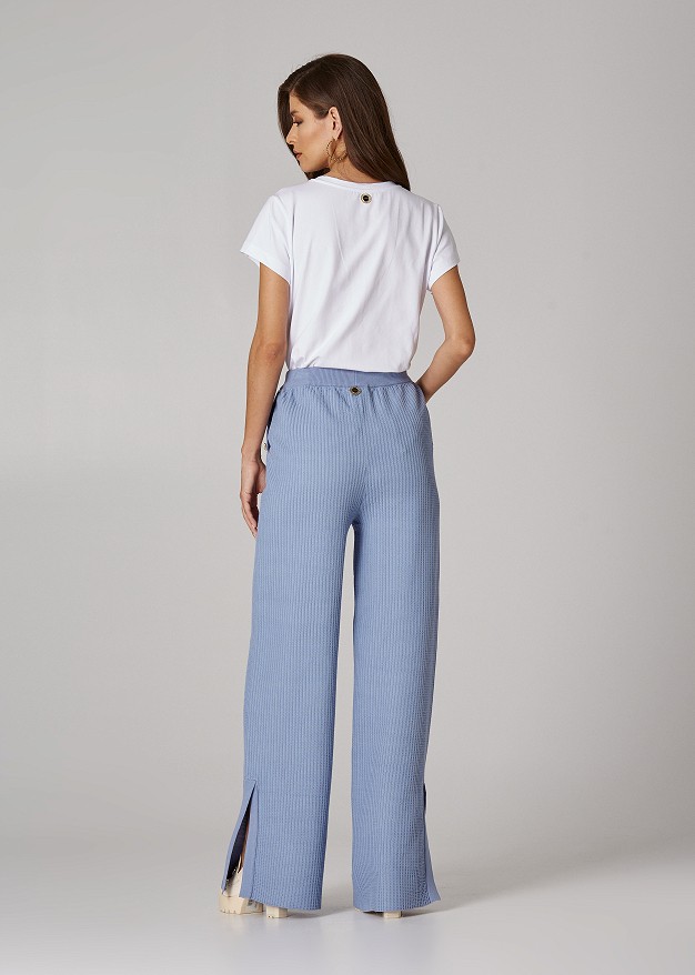 Knitted trousers with decorative buttons