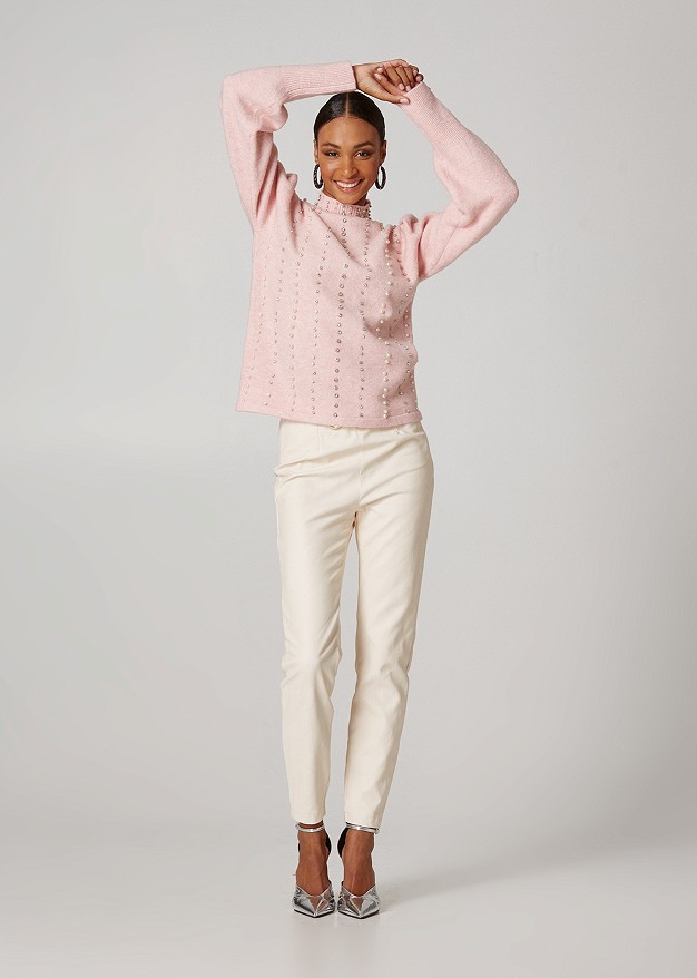 High necked knitted sweater with embellishments