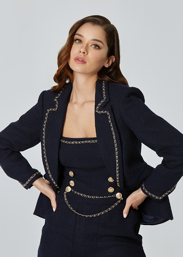 Tweed jacket decorated with chains