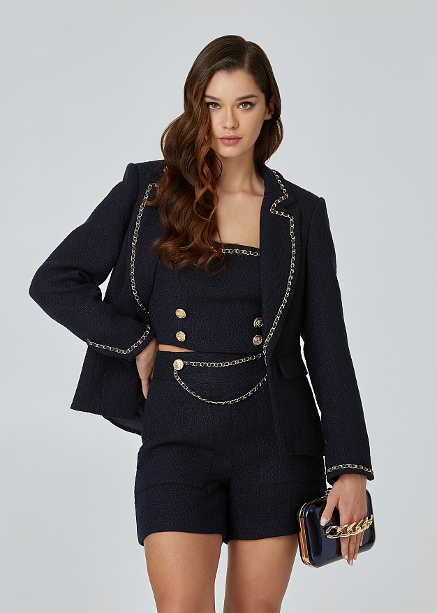 Tweed jacket decorated with chains