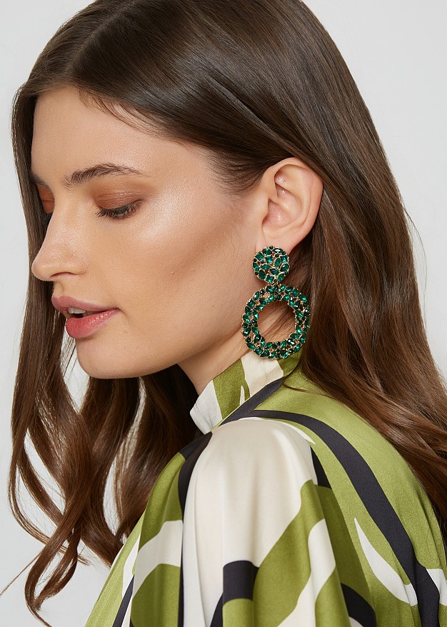 Circular green earrings with rhinestones