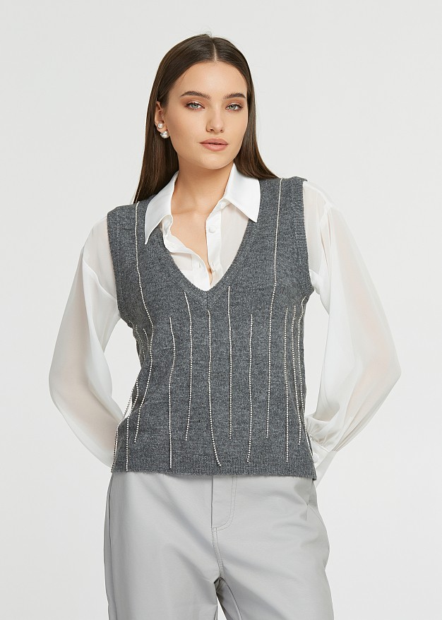 Sleeveless sweater with decorative strass lines