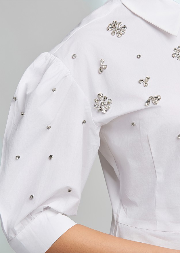 Shirt decorated with rhinestones