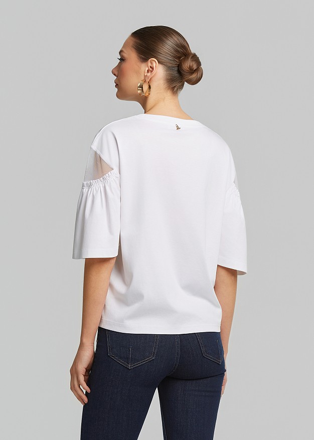 Blouse with sheer detail on the sleeves