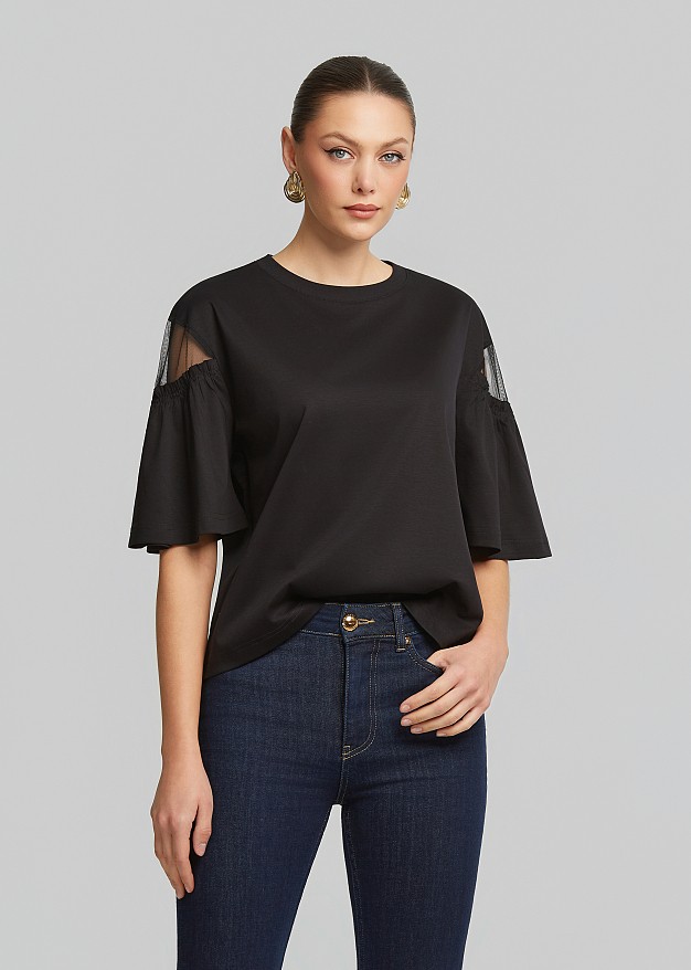 Blouse with sheer detail on the sleeves