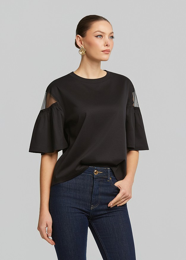 Blouse with sheer detail on the sleeves