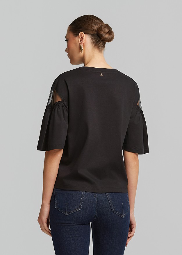 Blouse with sheer detail on the sleeves