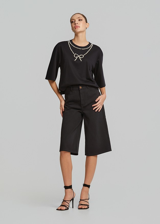 Crop top with a pearl-adorned bow detail