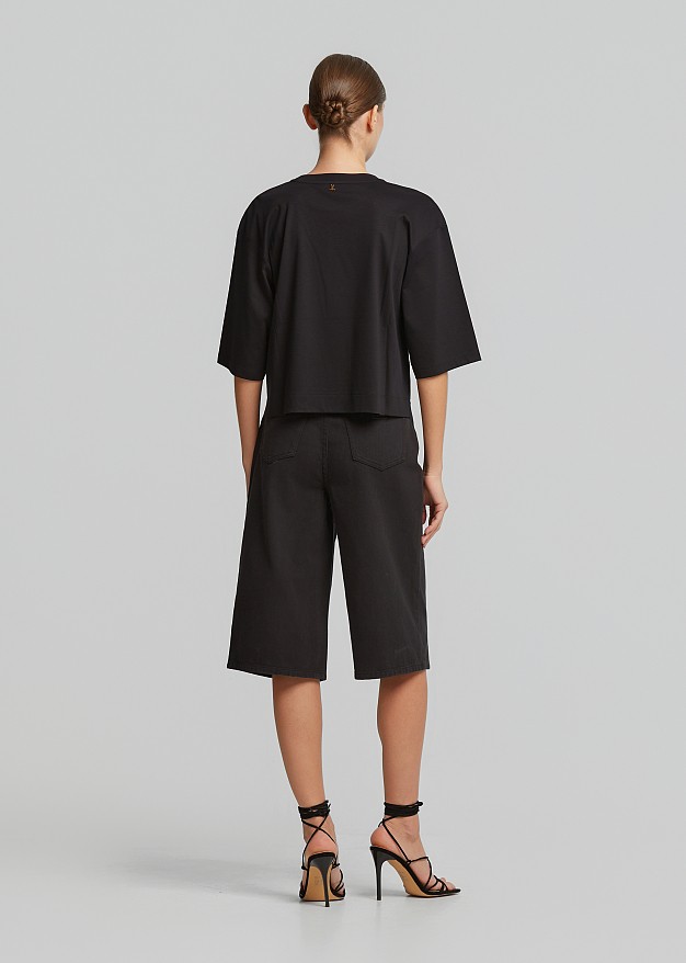 Crop top with a pearl-adorned bow detail