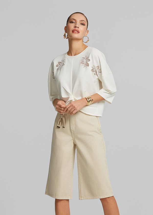Blouse with sheer details