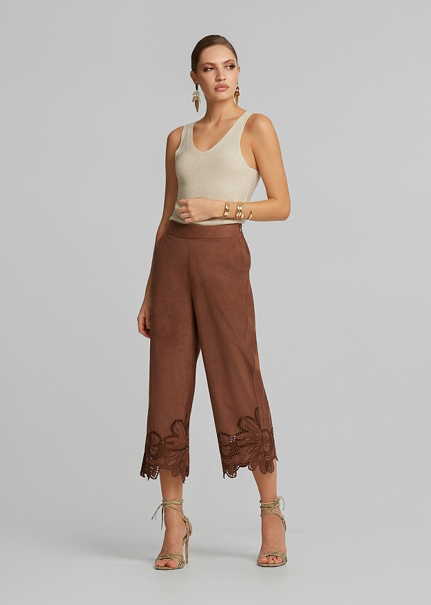 Soft suede-look finish pants and laser-cut accents