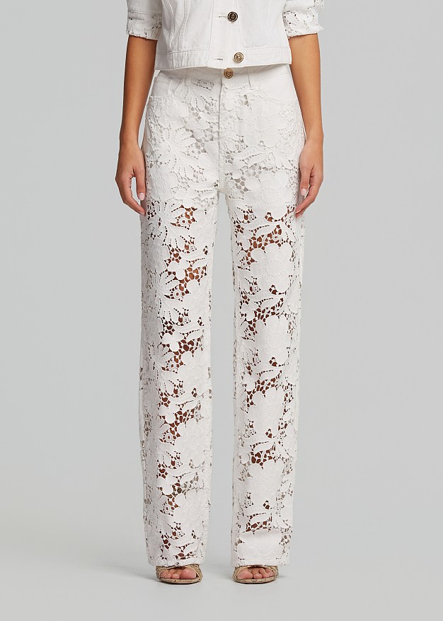Denim pants in embossed lace