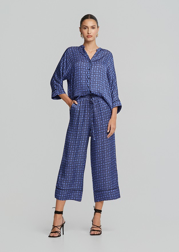 Satin look pants in logo print