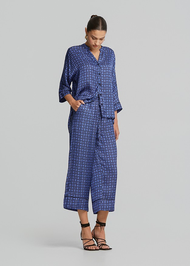 Satin look pants in logo print