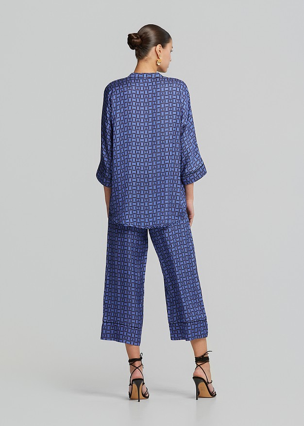 Satin look pants in logo print