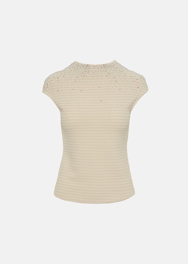 Knitted top with a seamless cut