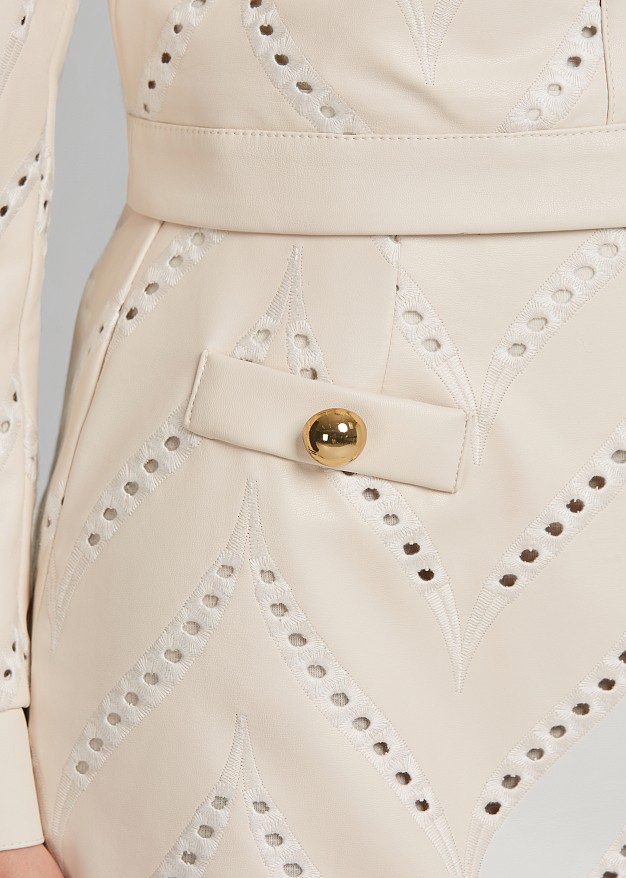 Mini skirt in laser cut design and leather look