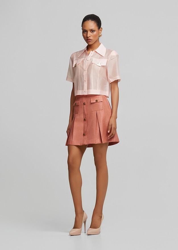 Pleated mini skirt with a silky finish