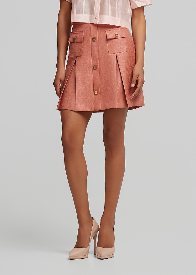 Pleated mini skirt with a silky finish