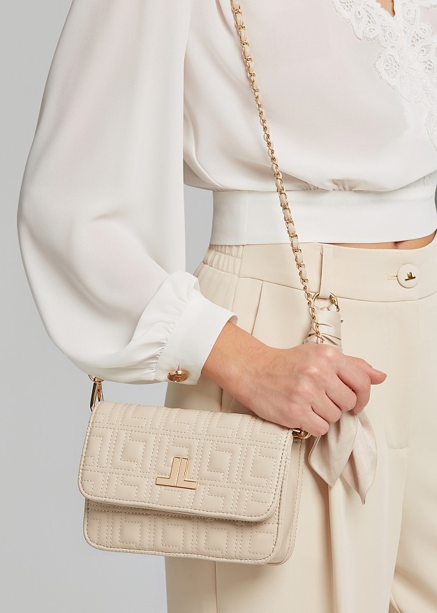 Quilted shoulder bag in leather-look