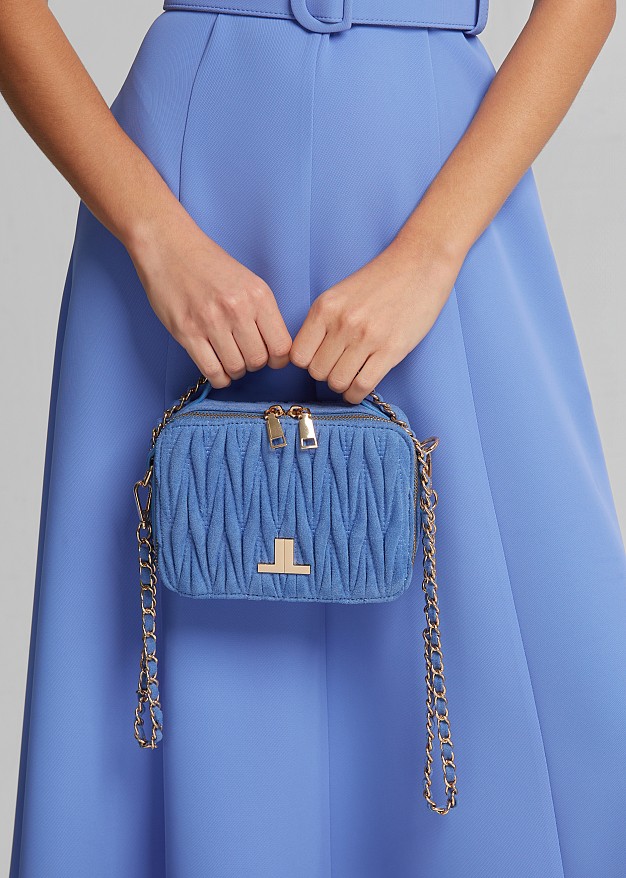 Quilted handbag with suede
