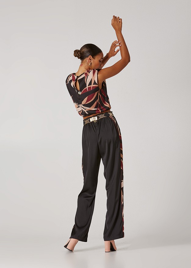 Satin look pants with floral details