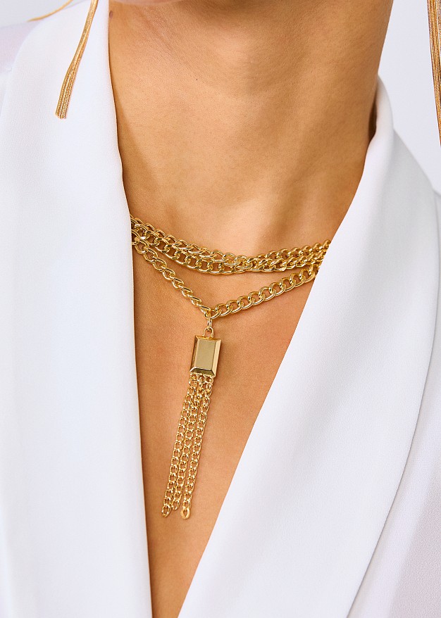 Wrap blouse with decorative necklace