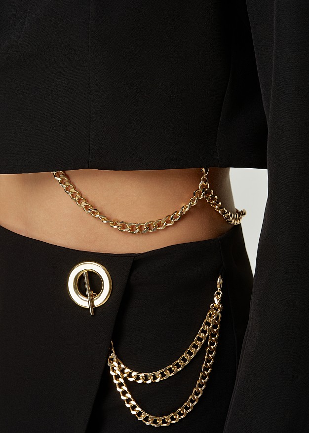 Cropped suit jacket with chains all over