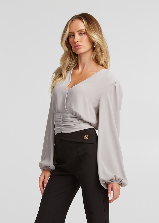 Blouse in wrap style with V neckline