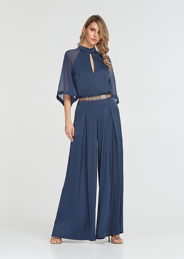 Jumpsuit with mesh fabric on the sleeves