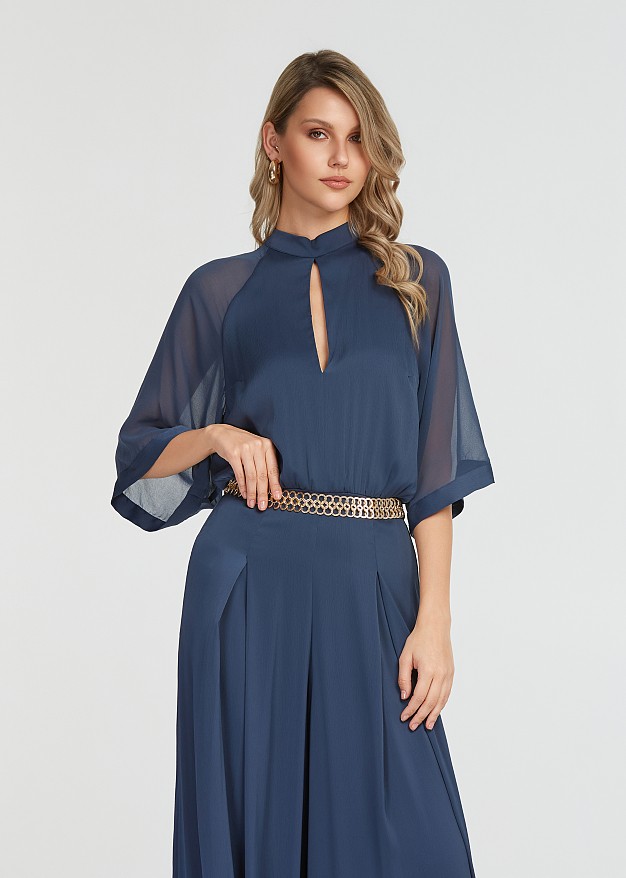 Jumpsuit with mesh fabric on the sleeves