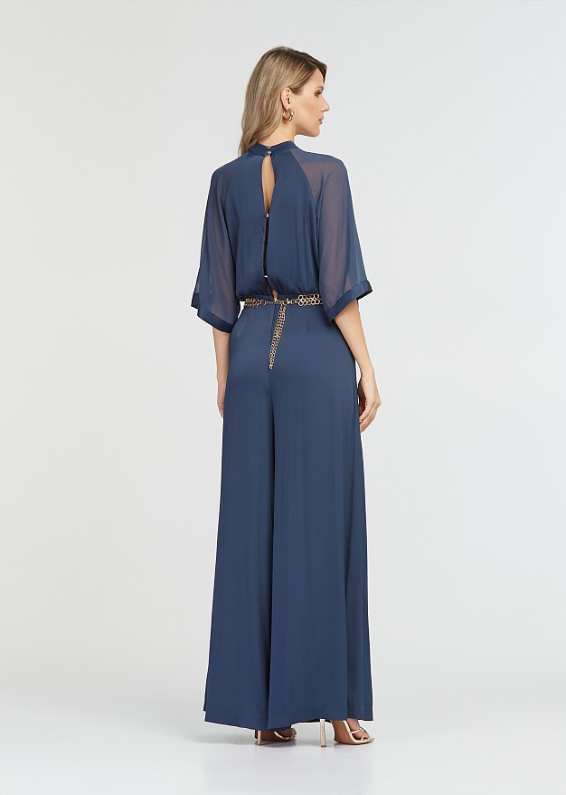 Jumpsuit with mesh fabric on the sleeves